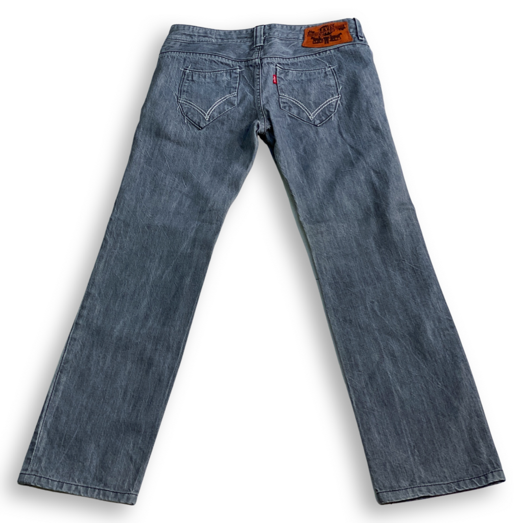 SUPER RARE LADIES LEVIS COPPER JEANS // Button fly, special stitch and copper hardware details. Size 27 waist 32 length.