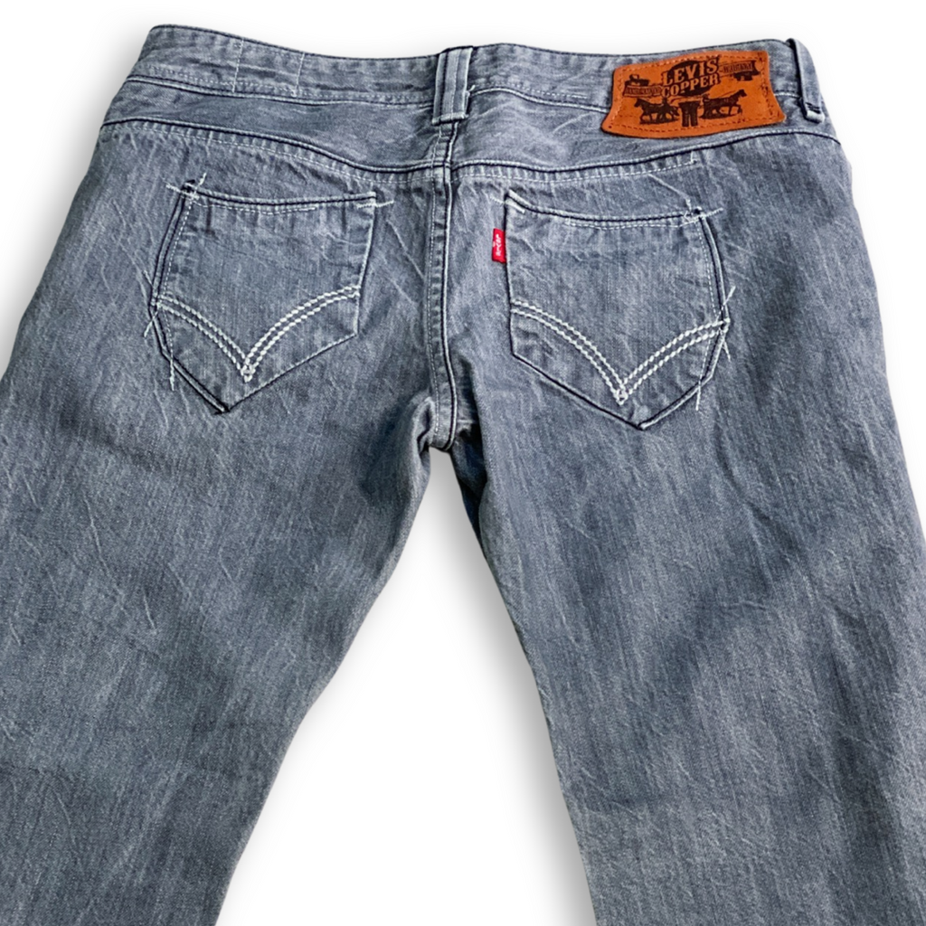 SUPER RARE LADIES LEVIS COPPER JEANS // Button fly, special stitch and copper hardware details. Size 27 waist 32 length.