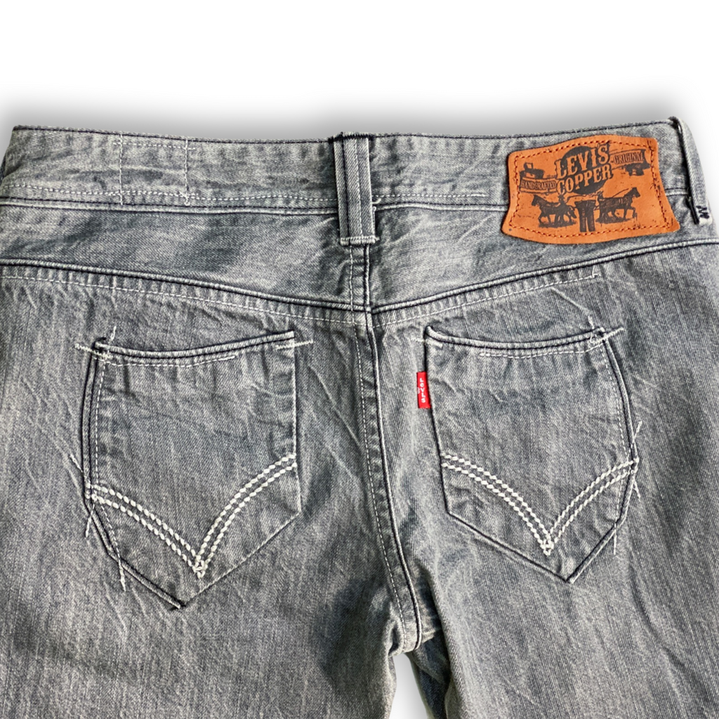 SUPER RARE LADIES LEVIS COPPER JEANS // Button fly, special stitch and copper hardware details. Size 27 waist 32 length.