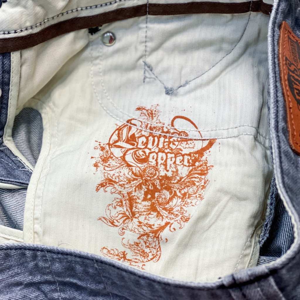 SUPER RARE LADIES LEVIS COPPER JEANS // Button fly, special stitch and copper hardware details. Size 27 waist 32 length.