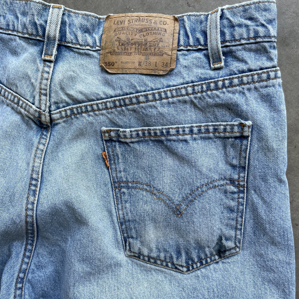 Vintage Levi Orange Tab 550 90s blue denim jeans light wash 38x34 36x32