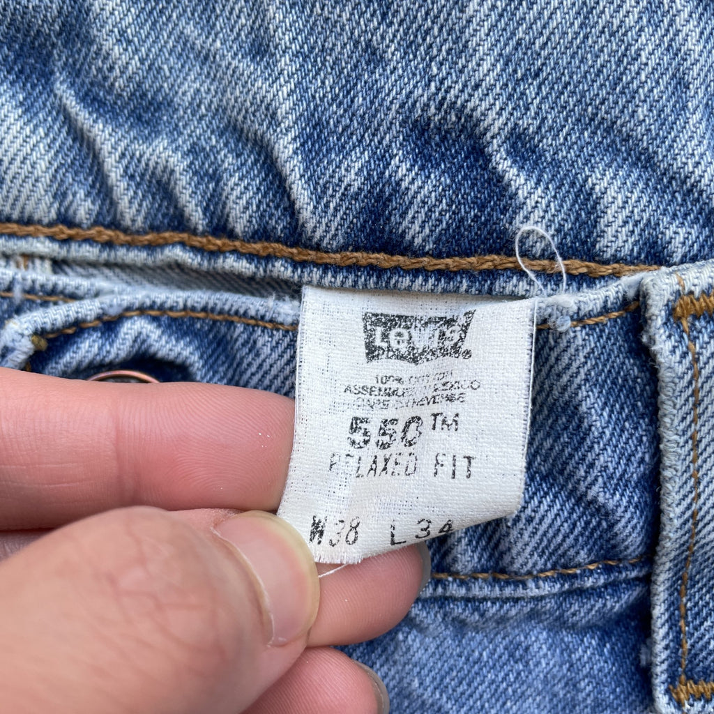 Vintage Levi Orange Tab 550 90s blue denim jeans light wash 38x34 36x32