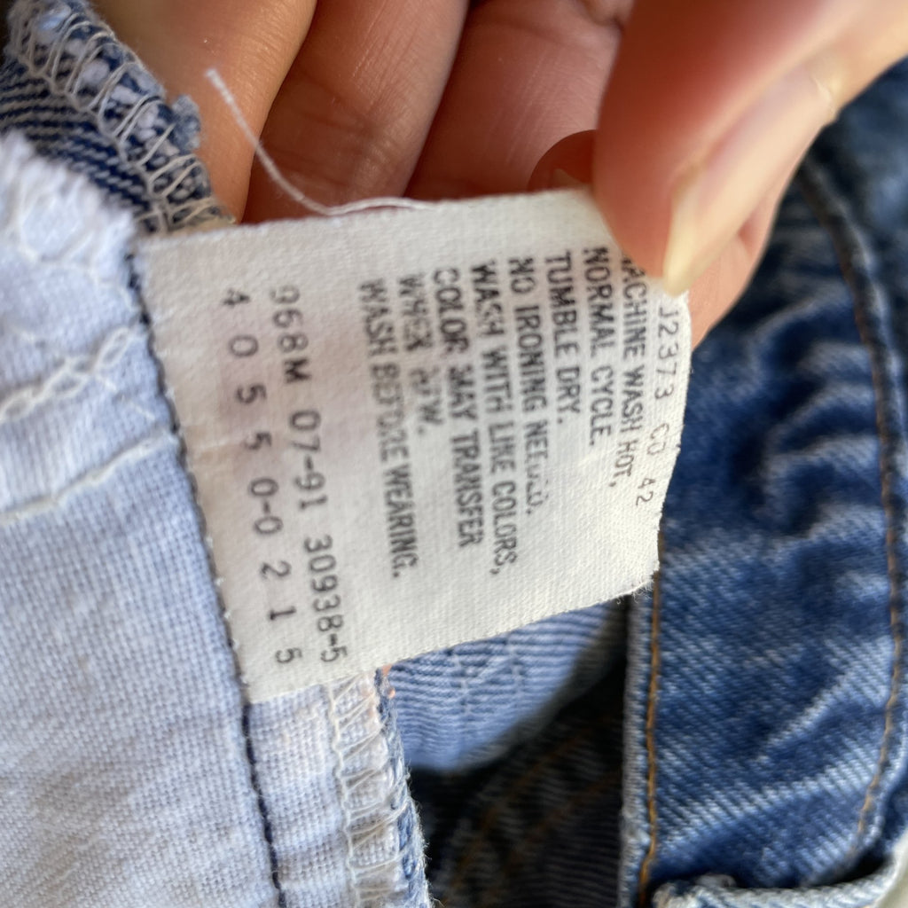Vintage Levi Orange tab 550 made in usa blue denim jeans light wash 38x34 36x33