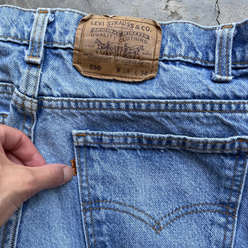 Vintage Levi Orange tab 550 made in usa blue denim jeans light wash 38x34 36x34