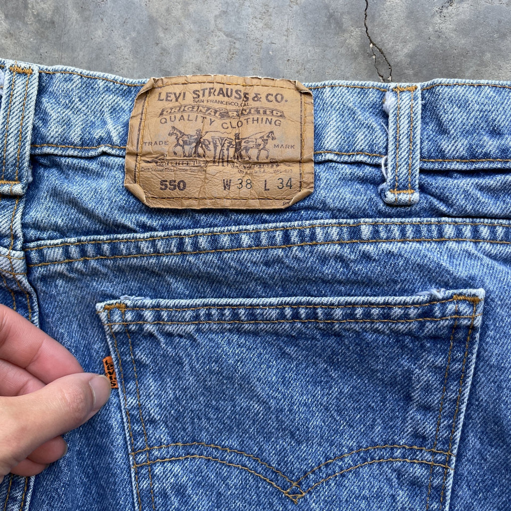 Vintage Levi Orange tab 550 made in usa blue denim jeans light wash 38x34 35x32