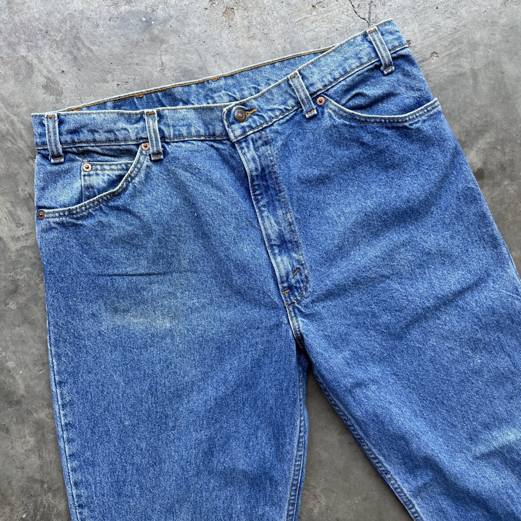 Vintage Levi Orange tab 550 made in usa blue denim jeans light wash 38x34 35x32