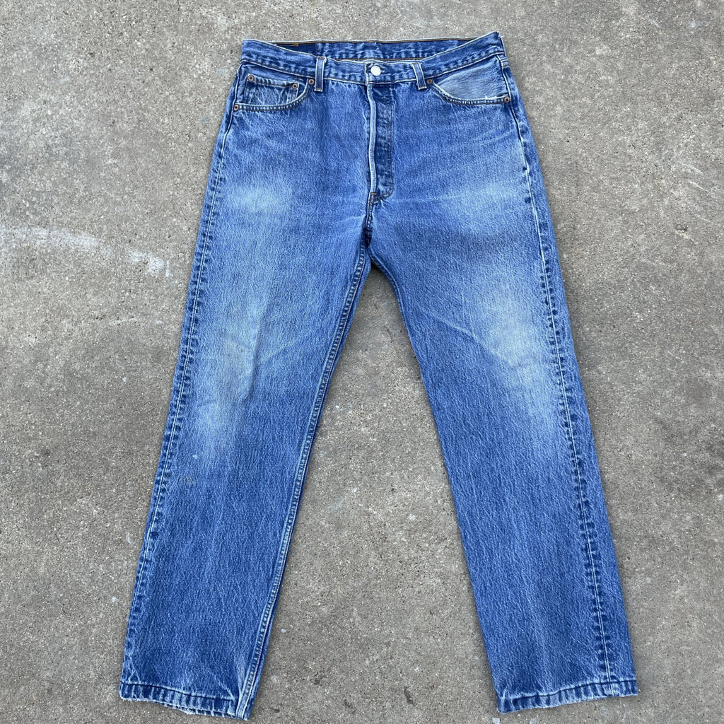 Vintage Levi 501 0115 made in usa 33x30 denim jeans medium blue faded 90s