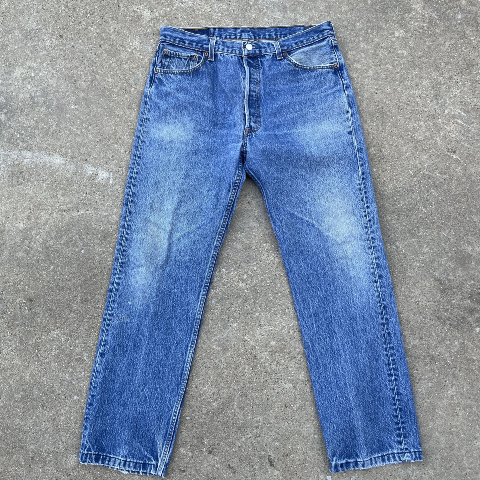 Vintage Levi 501 0115 made in usa 33x30 denim jeans medium blue faded 90s