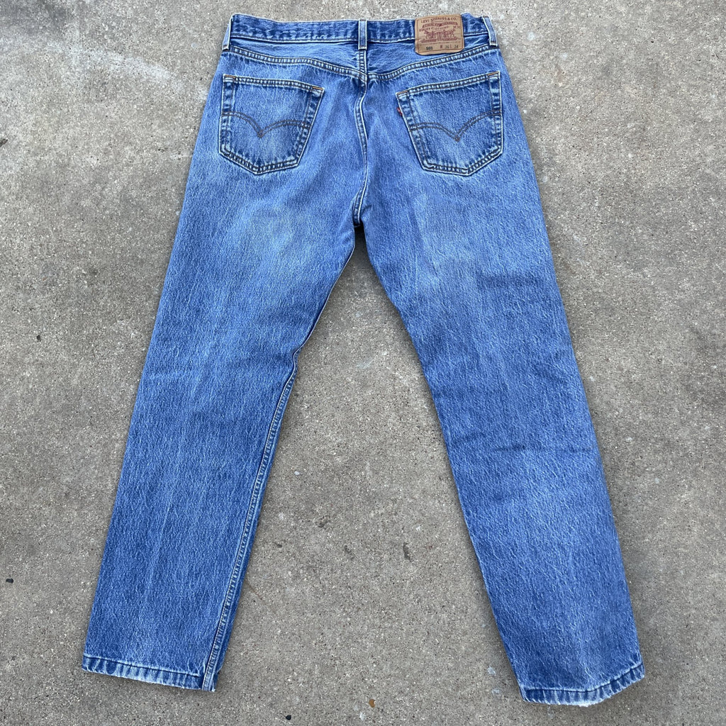 Vintage Levi 501 0115 made in usa 33x30 denim jeans medium blue faded 90s