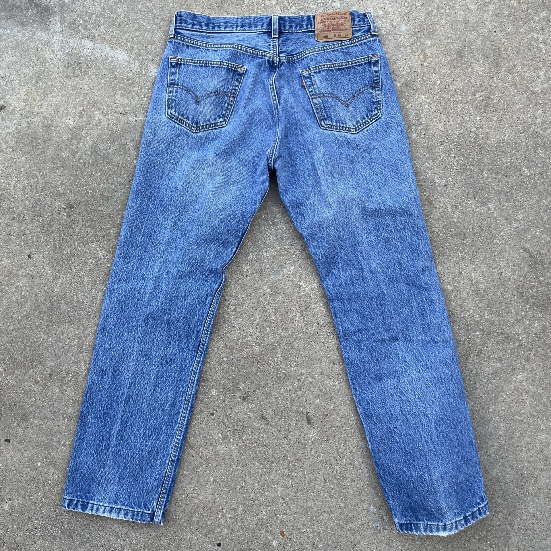 Vintage Levi 501 0115 made in usa 33x30 denim jeans medium blue faded 90s