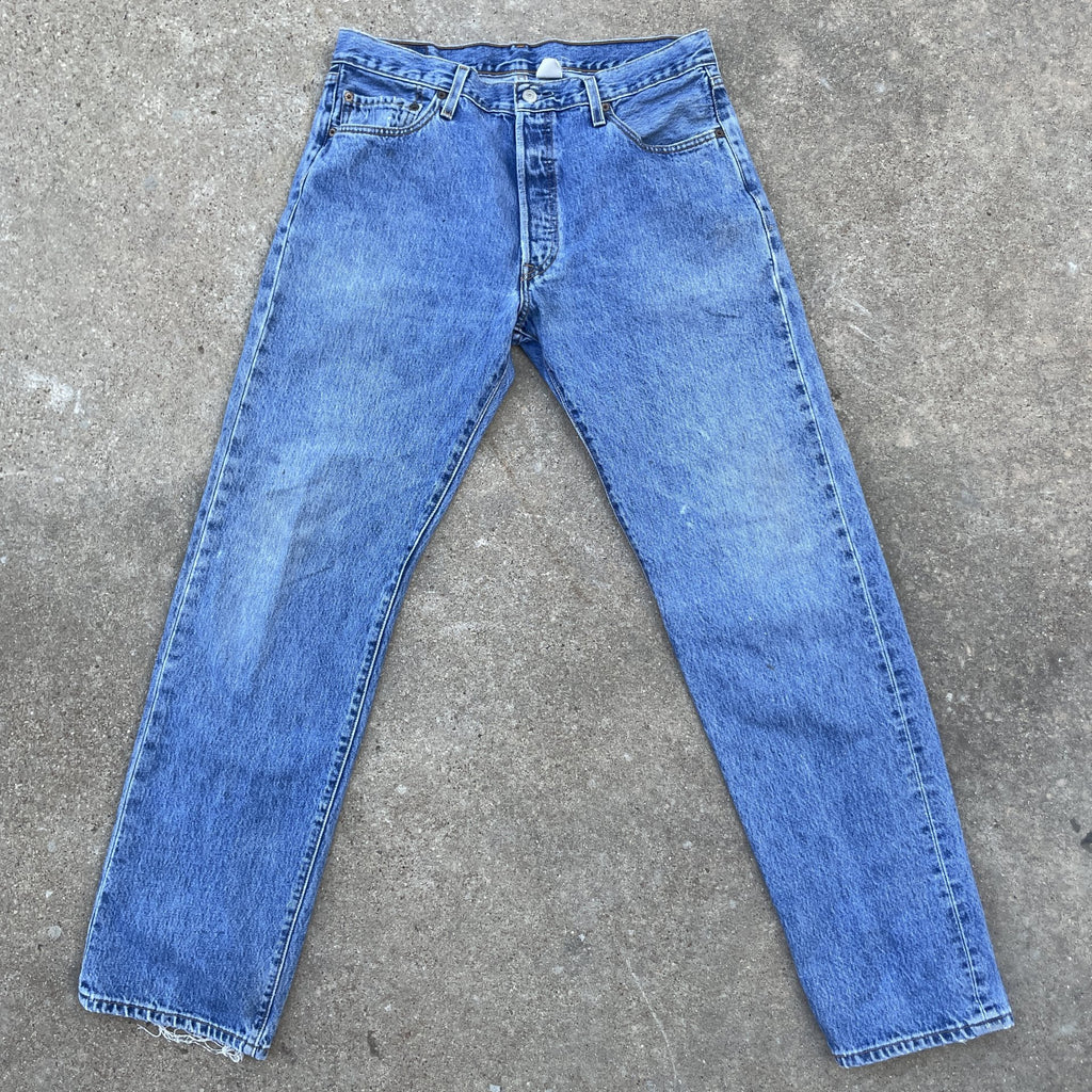 Vintage Levi 501 33x32 denim jeans medium blue faded