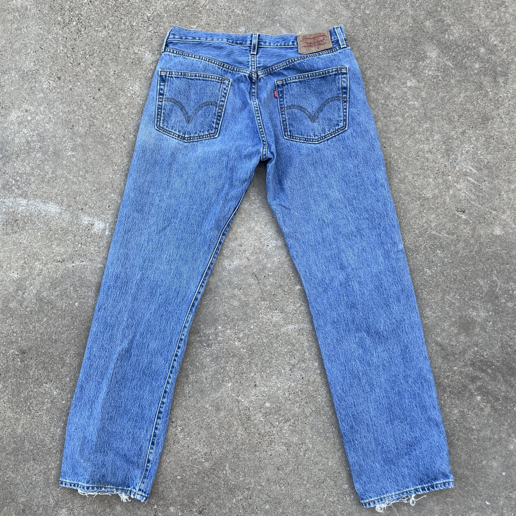 Vintage Levi 501 33x32 denim jeans medium blue faded