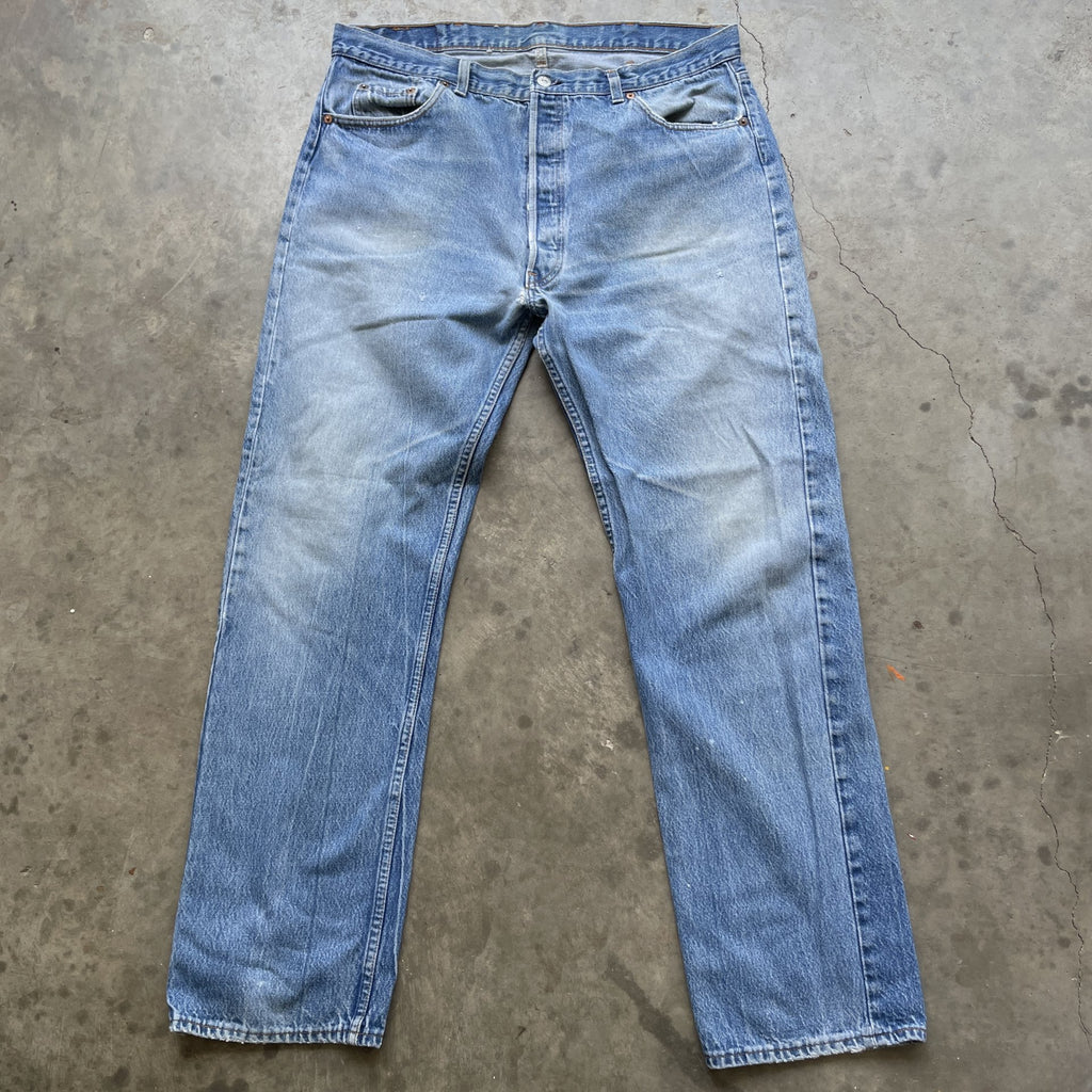 Vintage 90s Levi 501 medium wash blue denim jeans 40x34 fit 37x32