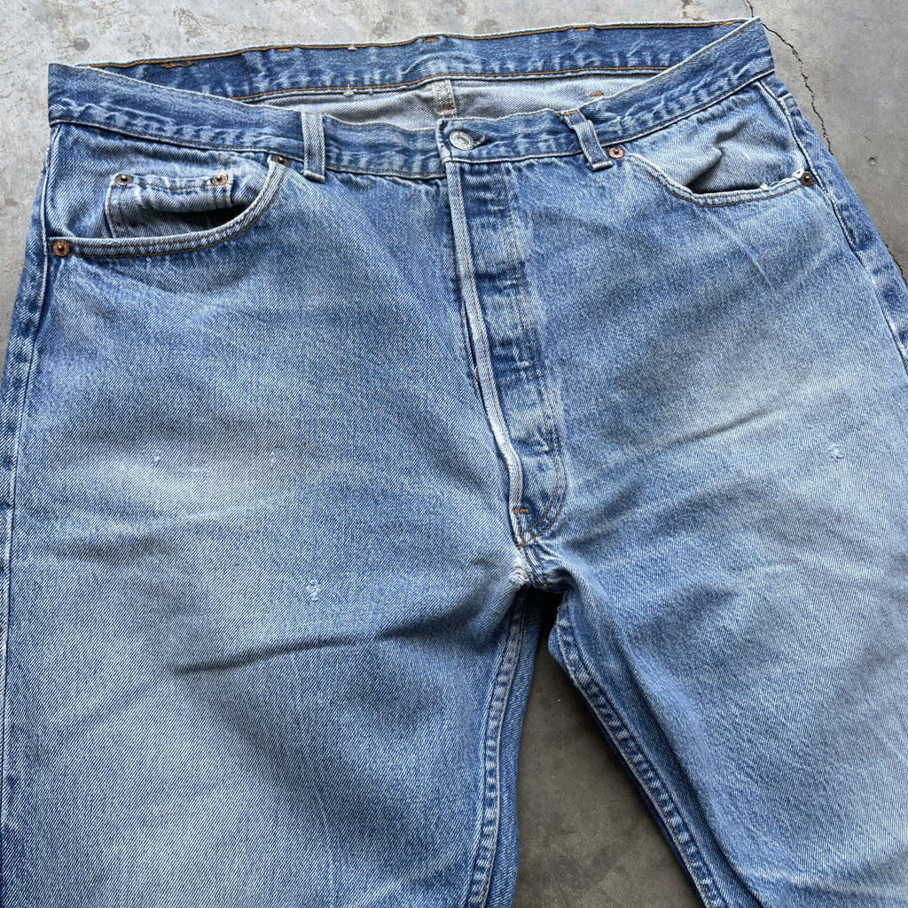 Vintage 90s Levi 501 medium wash blue denim jeans 40x34 fit 37x32