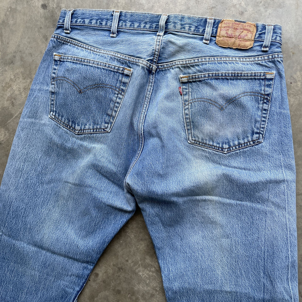 Vintage 90s Levi 501 medium wash blue denim jeans 40x34 fit 37x32