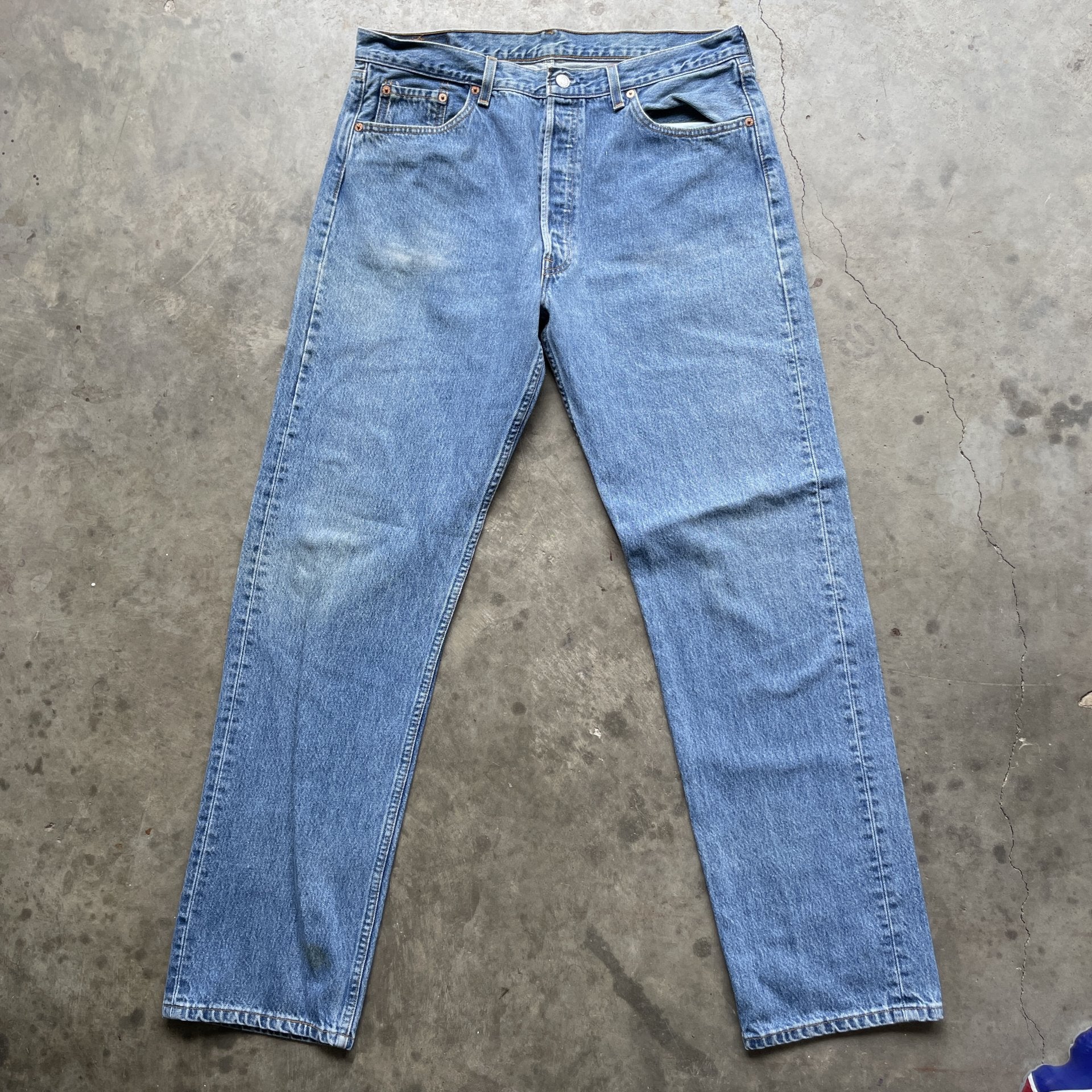 Vintage 90s Levi 501 medium wash blue denim jeans 38x34 fit 35x33