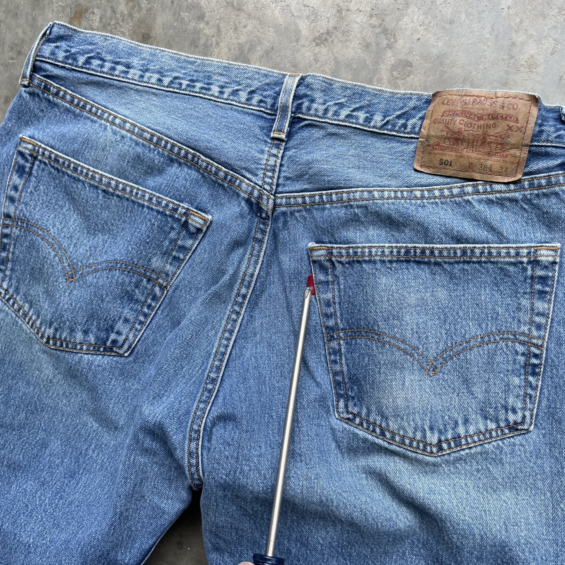 Vintage 90s Levi 501 medium wash blue denim jeans 38x34 fit 35x33