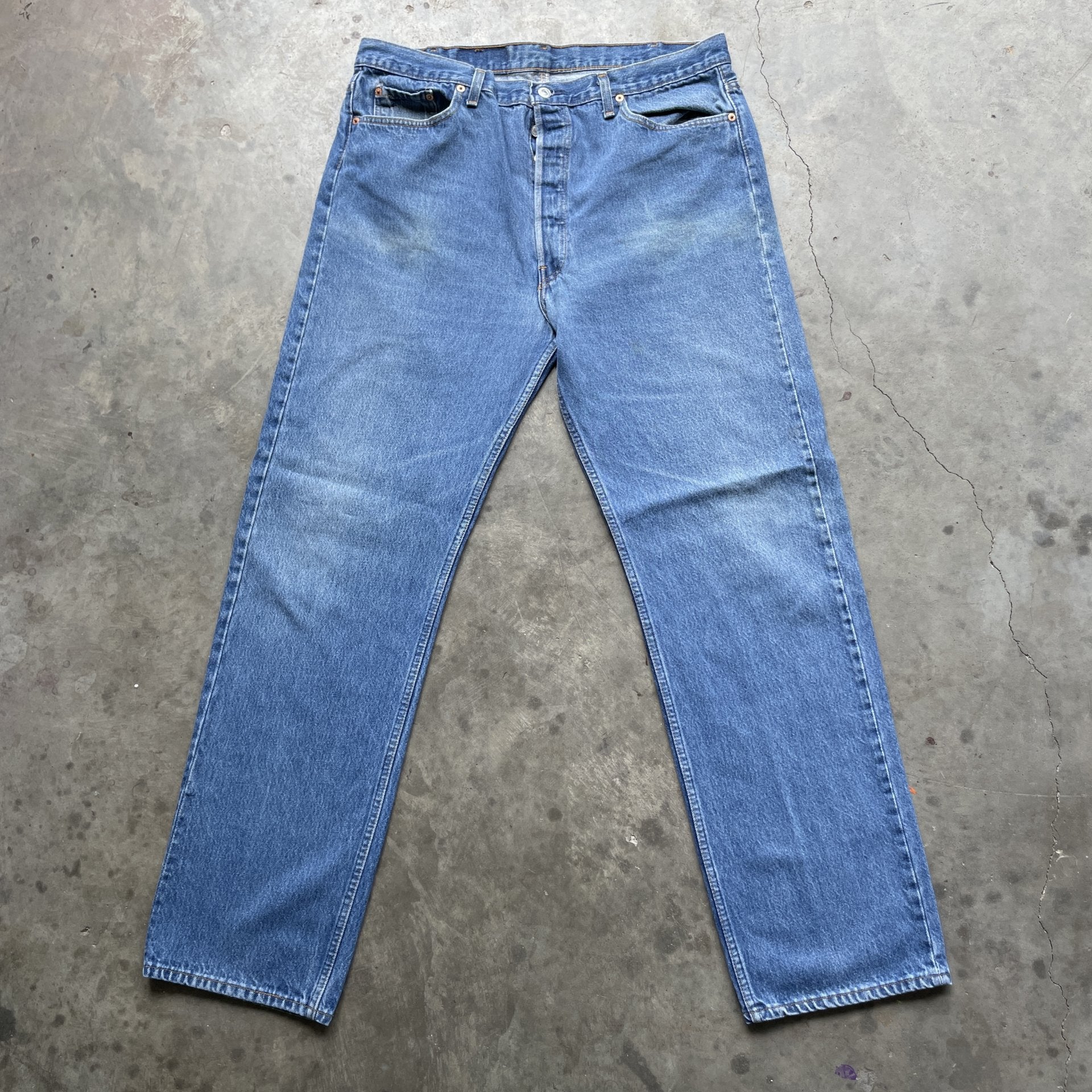 Vintage 90s Levi 501 medium wash blue denim jeans 40x34 fit 37x32.5