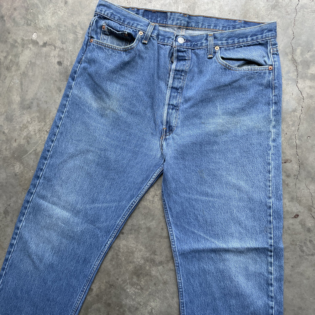 Vintage 90s Levi 501 medium wash blue denim jeans 40x34 fit 37x32.5