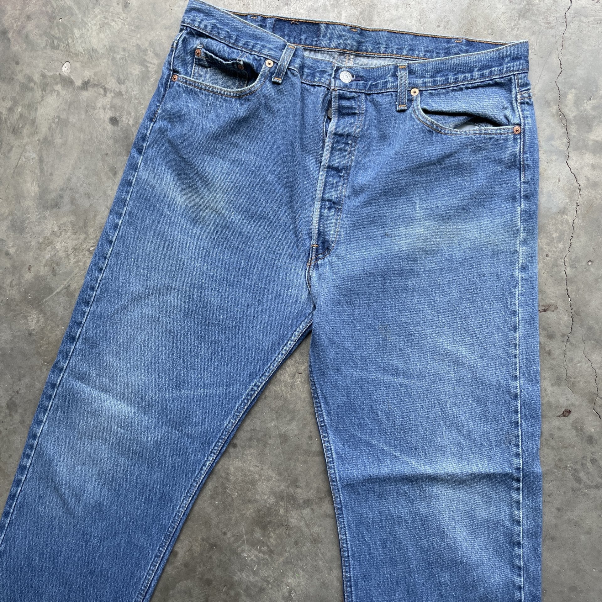 Vintage 90s Levi 501 medium wash blue denim jeans 40x34 fit 37x32.5