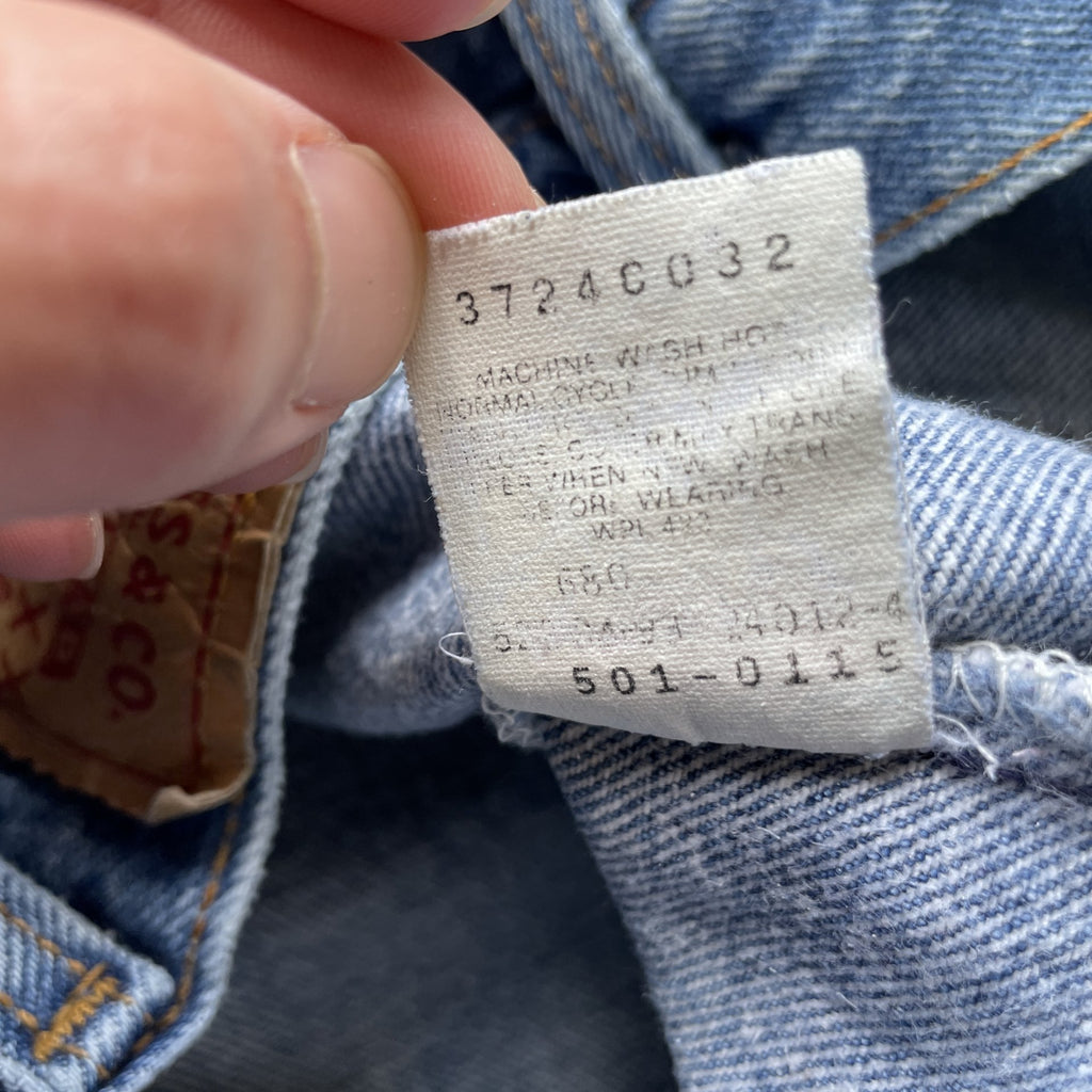 Vintage 90s Levi 501 medium wash blue denim jeans 40x34 fit 37x32.5