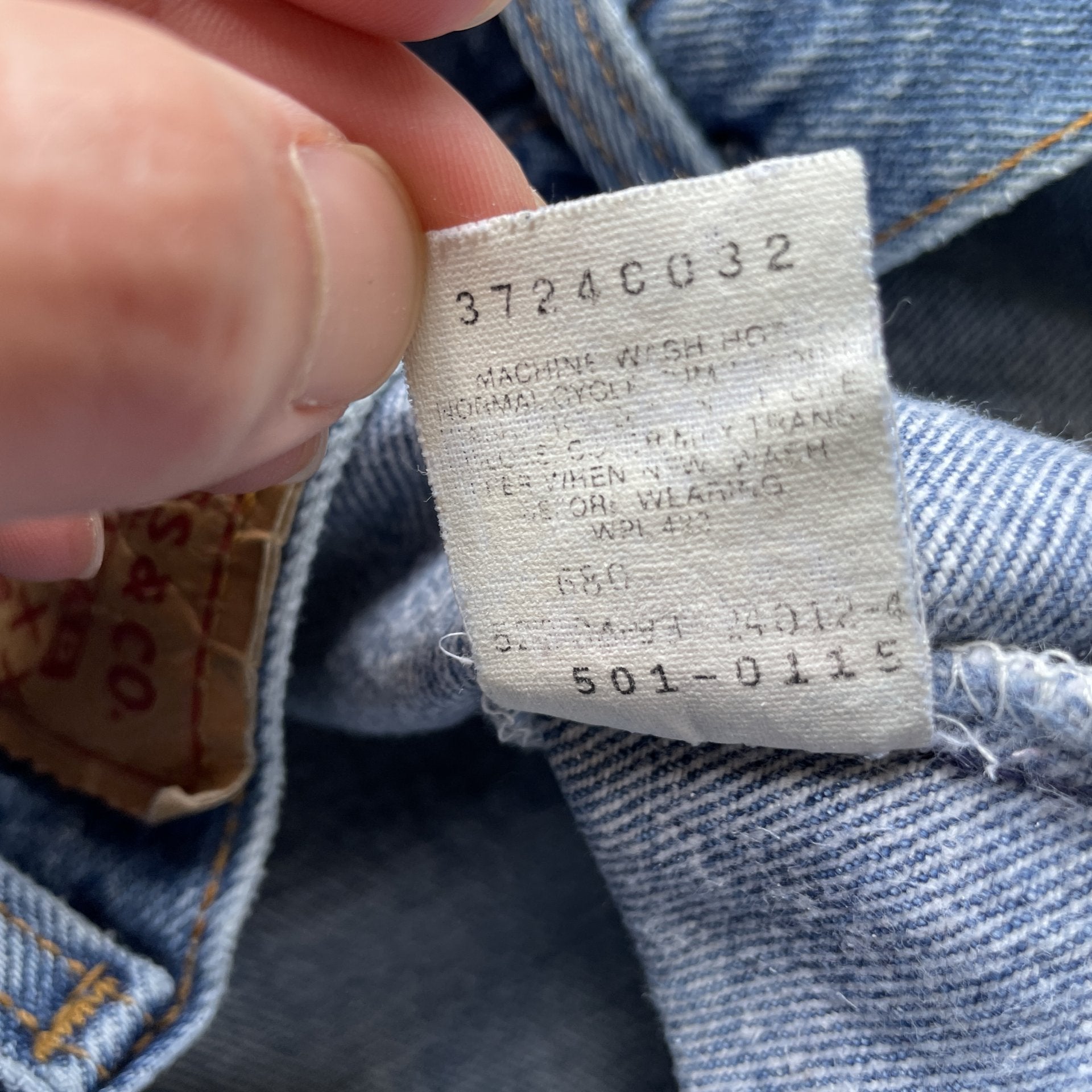 Vintage 90s Levi 501 medium wash blue denim jeans 40x34 fit 37x32.5