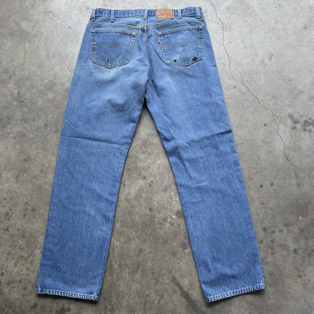 Vintage 90s Levi 501 medium wash blue denim jeans 40x34 fit 37x32.5