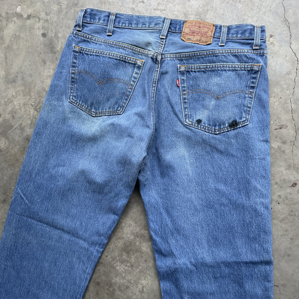 Vintage 90s Levi 501 medium wash blue denim jeans 40x34 fit 37x32.5