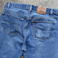 Vintage 80s Levi 501 medium wash blue denim jeans 38x34 fit 35x32