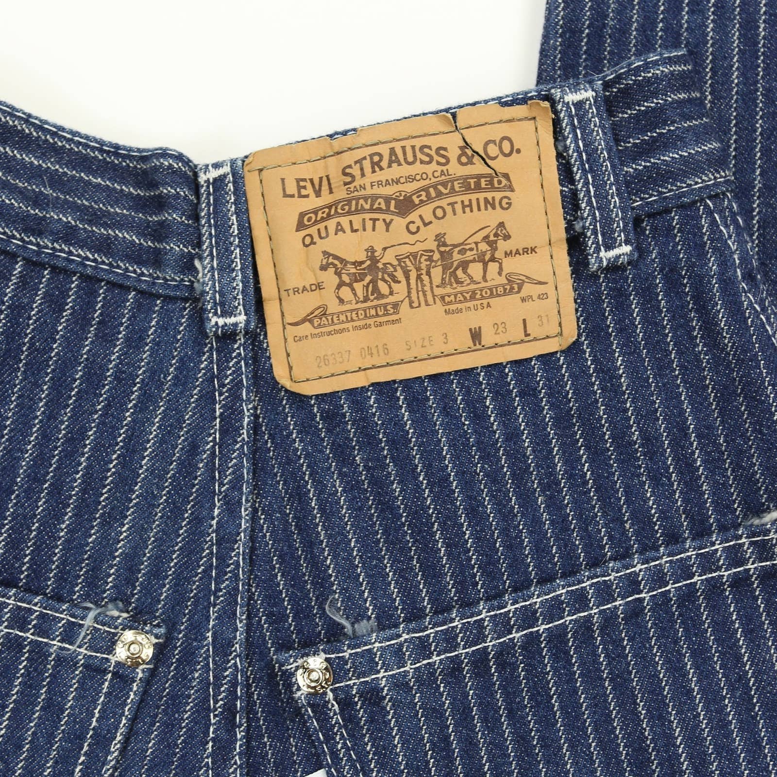 VINTAGE LEVI’S DEADSTOCK 1980’S BLUE AND WHITE PIN STRIPE HIGH WAISTED JEANS